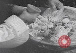 Image of Palestinian boy and mother making bread Palestine, 1941, second 18 stock footage video 65675079606