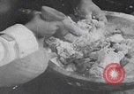 Image of Palestinian boy and mother making bread Palestine, 1941, second 20 stock footage video 65675079606