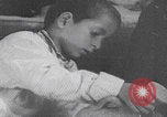 Image of Palestinian boy and mother making bread Palestine, 1941, second 23 stock footage video 65675079606