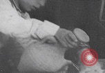 Image of Palestinian boy and mother making bread Palestine, 1941, second 24 stock footage video 65675079606