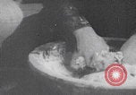 Image of Palestinian boy and mother making bread Palestine, 1941, second 26 stock footage video 65675079606