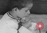 Image of Palestinian boy and mother making bread Palestine, 1941, second 38 stock footage video 65675079606
