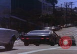 Image of San Francisco vehicles on road San Francisco California USA, 1969, second 1 stock footage video 65675079618