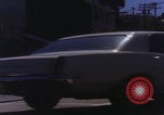 Image of San Francisco vehicles on road San Francisco California USA, 1969, second 14 stock footage video 65675079618