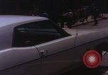 Image of San Francisco vehicles on road San Francisco California USA, 1969, second 44 stock footage video 65675079618