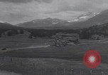 Image of Rocky Mountain National Park car driving Colorado United States USA, 1927, second 14 stock footage video 65675079627