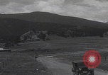 Image of Rocky Mountain National Park car driving Colorado United States USA, 1927, second 33 stock footage video 65675079627