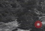 Image of Rocky Mountain National Park car driving Colorado United States USA, 1927, second 42 stock footage video 65675079627