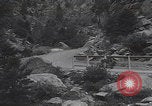 Image of Rocky Mountain National Park car driving Colorado United States USA, 1927, second 49 stock footage video 65675079627