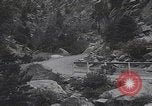 Image of Rocky Mountain National Park car driving Colorado United States USA, 1927, second 50 stock footage video 65675079627