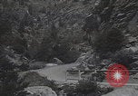 Image of Rocky Mountain National Park car driving Colorado United States USA, 1927, second 52 stock footage video 65675079627