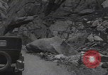 Image of Rocky Mountain National Park car driving Colorado United States USA, 1927, second 60 stock footage video 65675079627