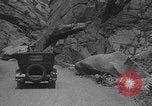 Image of Rocky Mountain National Park car driving Colorado United States USA, 1927, second 62 stock footage video 65675079627