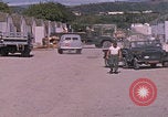 Standbild Eingang zum GTMO Naval Exchange-Shop Guantanamo Bay, Kuba, 1962, aus Sekunde 11 historischem Filmmaterial Videoclip 65675079673