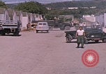 Standbild Eingang zum GTMO Naval Exchange-Shop Guantanamo Bay, Kuba, 1962, aus Sekunde 13 historischem Filmmaterial Videoclip 65675079673