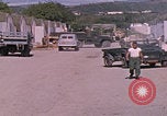 Standbild Eingang zum GTMO Naval Exchange-Shop Guantanamo Bay, Kuba, 1962, aus Sekunde 15 historischem Filmmaterial Videoclip 65675079673
