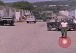 Standbild Eingang zum GTMO Naval Exchange-Shop Guantanamo Bay, Kuba, 1962, aus Sekunde 17 historischem Filmmaterial Videoclip 65675079673