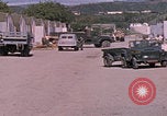 Standbild Eingang zum GTMO Naval Exchange-Shop Guantanamo Bay, Kuba, 1962, aus Sekunde 29 historischem Filmmaterial Videoclip 65675079673