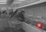 Image of Hungarian refugee shopping Chicago Illinois USA, 1956, second 1 stock footage video 65675079693