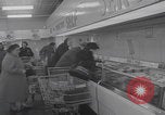 Image of Hungarian refugee shopping Chicago Illinois USA, 1956, second 3 stock footage video 65675079693