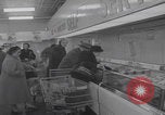 Image of Hungarian refugee shopping Chicago Illinois USA, 1956, second 4 stock footage video 65675079693
