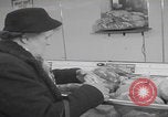 Image of Hungarian refugee shopping Chicago Illinois USA, 1956, second 7 stock footage video 65675079693