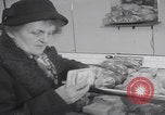 Image of Hungarian refugee shopping Chicago Illinois USA, 1956, second 8 stock footage video 65675079693