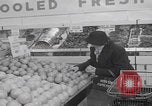 Image of Hungarian refugee shopping Chicago Illinois USA, 1956, second 11 stock footage video 65675079693