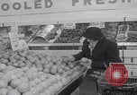 Image of Hungarian refugee shopping Chicago Illinois USA, 1956, second 12 stock footage video 65675079693