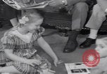 Image of Hungarian refugee shopping Chicago Illinois USA, 1956, second 30 stock footage video 65675079693