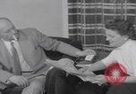 Image of Hungarian refugee shopping Chicago Illinois USA, 1956, second 39 stock footage video 65675079693