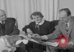 Image of Hungarian refugee shopping Chicago Illinois USA, 1956, second 42 stock footage video 65675079693