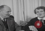 Image of Hungarian refugee shopping Chicago Illinois USA, 1956, second 52 stock footage video 65675079693