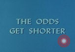 Image of casino dealer talks odds United States USA, 1967, second 15 stock footage video 65675079694