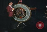 Image of casino dealer talks odds United States USA, 1967, second 27 stock footage video 65675079694
