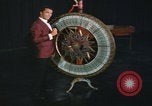 Image of casino dealer talks odds United States USA, 1967, second 28 stock footage video 65675079694