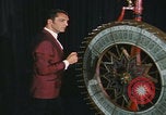 Image of casino dealer talks odds United States USA, 1967, second 35 stock footage video 65675079694