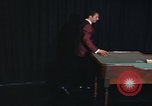 Image of casino dealer talks odds United States USA, 1967, second 47 stock footage video 65675079694