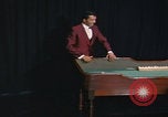 Image of casino dealer talks odds United States USA, 1967, second 48 stock footage video 65675079694