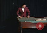 Image of casino dealer talks odds United States USA, 1967, second 49 stock footage video 65675079694