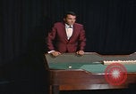 Image of casino dealer talks odds United States USA, 1967, second 51 stock footage video 65675079694