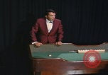 Image of casino dealer talks odds United States USA, 1967, second 52 stock footage video 65675079694