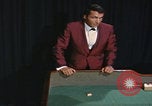 Image of casino dealer talks odds United States USA, 1967, second 60 stock footage video 65675079694