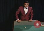 Image of casino dealer talks odds United States USA, 1967, second 62 stock footage video 65675079694