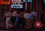 Image of tired men driving desert highway Las Vegas Nevada USA, 1967, second 3 stock footage video 65675079701