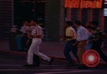 Image of tired men driving desert highway Las Vegas Nevada USA, 1967, second 4 stock footage video 65675079701