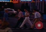 Image of tired men driving desert highway Las Vegas Nevada USA, 1967, second 6 stock footage video 65675079701