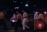 Image of tired men driving desert highway Las Vegas Nevada USA, 1967, second 10 stock footage video 65675079701