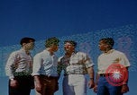 Image of tired men driving desert highway Las Vegas Nevada USA, 1967, second 14 stock footage video 65675079701