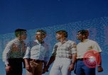 Image of tired men driving desert highway Las Vegas Nevada USA, 1967, second 16 stock footage video 65675079701